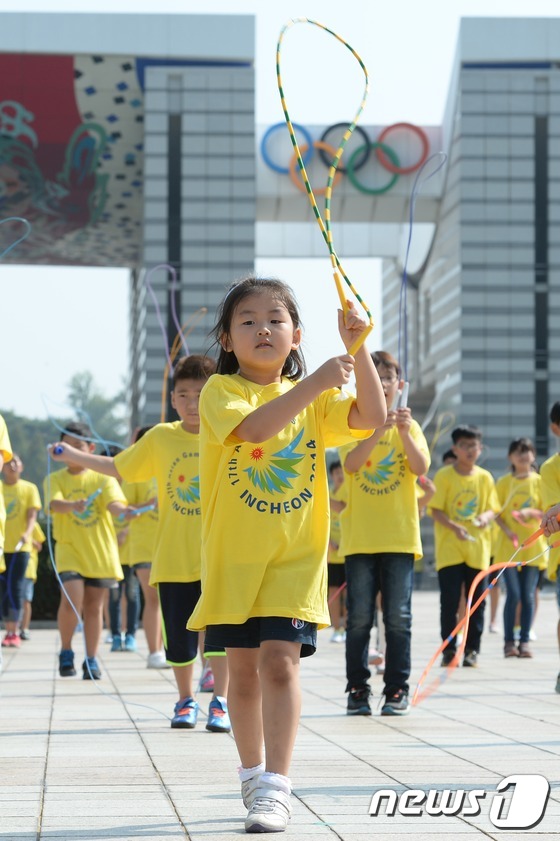 한국아동 줄뛰기공연으로 아시아경기대회 환경보호 리념 선전